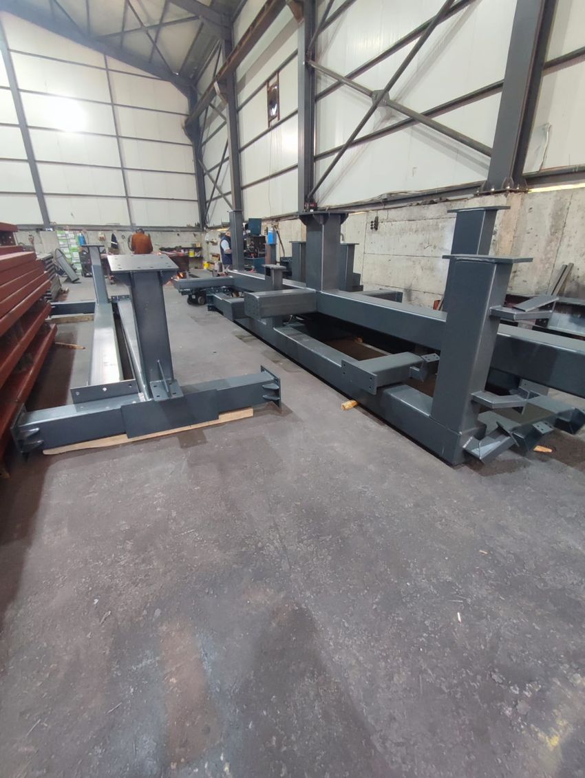Fabricated steel column and beam assemblies in the workshop